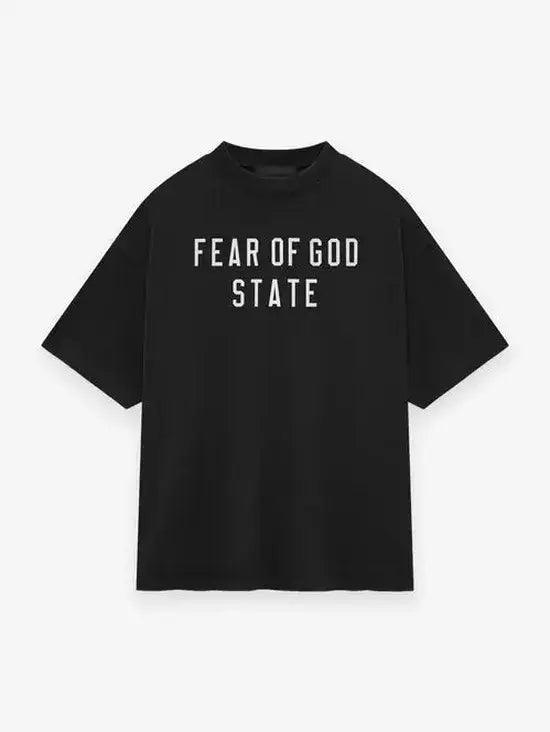 Fear of God Essentials Collection black heavy crewneck tee showcasing front design 'FEAR OF GOD STATE', premium quality fabric.