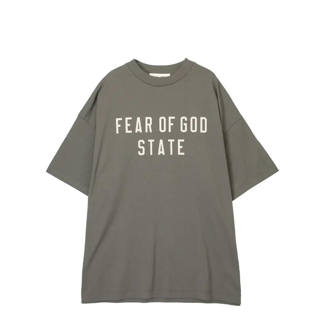 Fear of God Essentials Collection Heavy Crewneck Tee in gray featuring bold Fear of God State print, combining comfort and style.